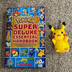 Pokemon Super Deluxe Essential Handbook and Mini Pikachu Plush